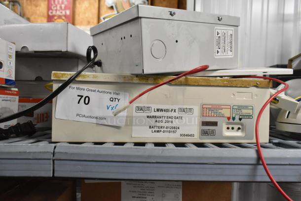 Auction lot featuring Altronix BH12DC8CB box, Schneider box, and emergency light. Includes labels with warranty info.