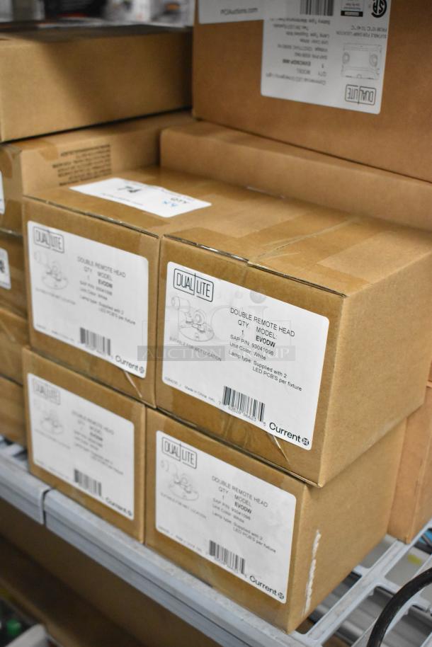 Brand new Dual Lite EVODW double remote head lights in box. Includes four units. Suitable for wet locations.