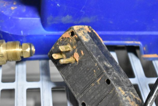 Plug and brass connector of 90403E Filter Pump, showing rust and wear. 110-120 Volts, 1 Phase, Model 90403E.