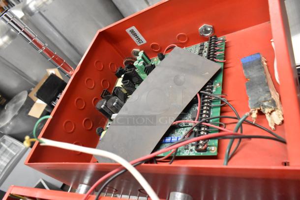 3 Wheelock PS-8 Powerpath NAC Extenders in red casing, visible wiring and components, labeled with serial number.