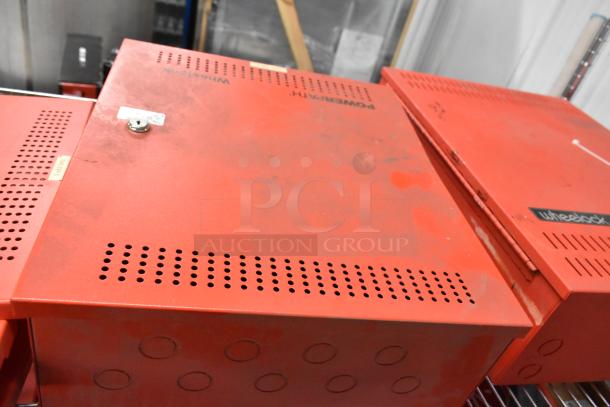 Three red Wheelock PS-8 Powerpath NAC Extenders, showing wear. Labeled with model details, used for expanding fire alarm systems.