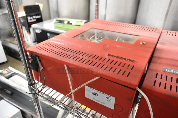 5 pieces: Wheelock SP40S Safepath 40W voice evacuation panel and SPB-160 audio booster. Visible wear. Panel marked "80 QTY X5".