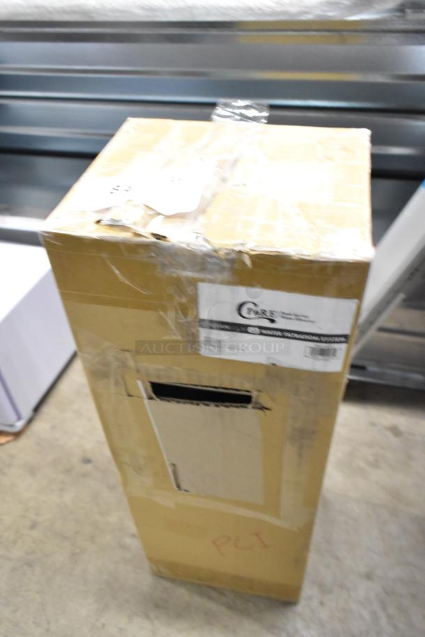 New Choice 790OCKITL2 L2 Water Filtration System, box slightly damaged, labeled "Care".