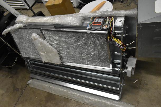 Daikin 122-DK-090 Economizer, vertical/downflow, low leak Jade model, excellent condition, visible wires and control box.