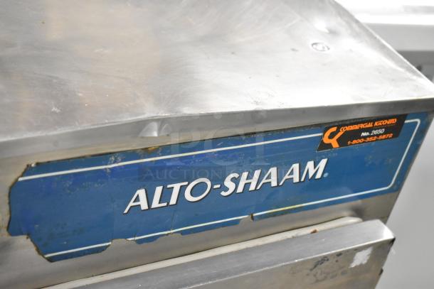 Alto Shaam 750-S stainless steel heated holding cabinet, visible wear on logo, 125V, 1 phase, commercial casters.