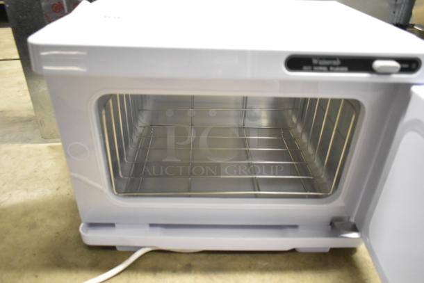 Towel warmer cabinet, 120V, 1 phase, excellent condition, with open front door showing interior racks.