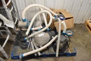 Bestway 58498E Sand Filter System on a pallet, features multiple hoses and components, condition appears used. Tags indicate model and specifications.