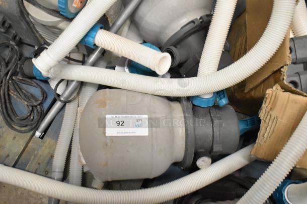 Bestway 58498E Sand Filter System; features hoses, pump; voltage 110-120V; auction tag visible; used condition.