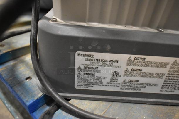 Bestway 58498E sand filter system, 110-120V, 1 phase. Visible label with operational cautions.