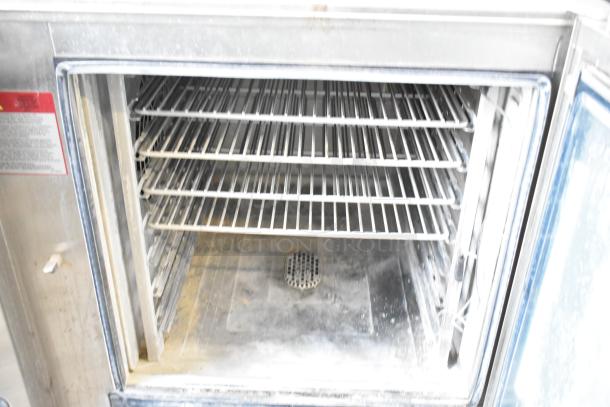 2021 Alto Shaam CTP7-20E stainless steel commercial combi convection oven, visible glass damage, 208-240V, 3 phase.