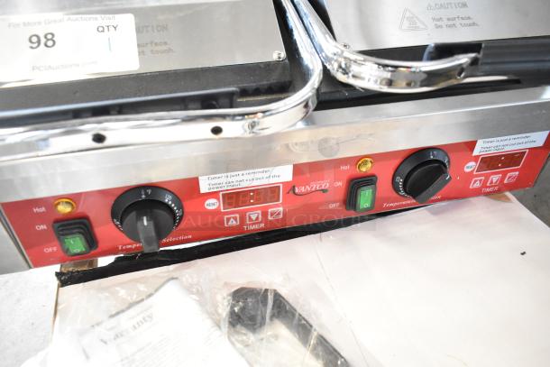 Brand new Avantco 177PG400GST dual panini grill, grooved top, smooth bottom, 19 5/8" x 9 1/8" surface, 120V, timer.