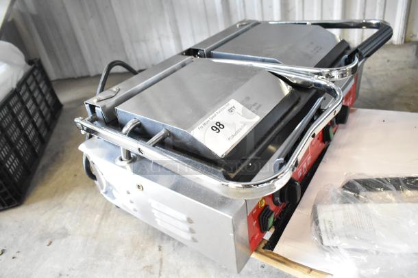 Brand new Avantco 177PG400GST stainless steel dual panini grill, grooved top, smooth bottom, 19 5/8" x 9 1/8".