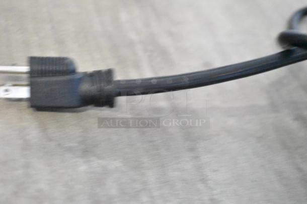 Close-up of the power cord for the Avantco 177PG400GST Panini Grill, showing a standard three-prong plug.
