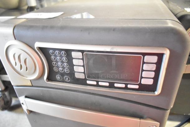 2020 Turbochef NGO rapid cook oven, electric-powered, 208/240V, 1 phase. Features digital controls, metal exterior, good condition.