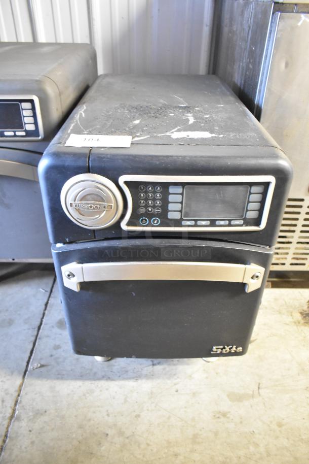 Turbochef NGO rapid cook oven, electric, 208/240V, 1 phase. Black, countertop model, digital controls, moderate wear.