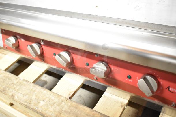 Avantco 177EG60E stainless steel electric griddle, features control knobs, 240 volts, 1 phase, commercial use, visible logo.