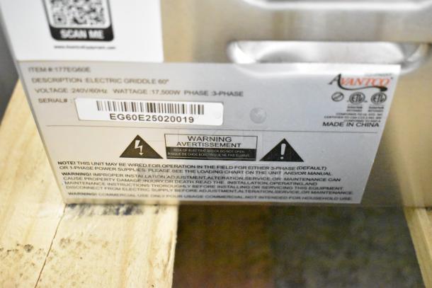 Avantco 177EG60E stainless steel commercial electric griddle. 240V, 1 phase. Warning labels attached. Serial: EG60E25020019.