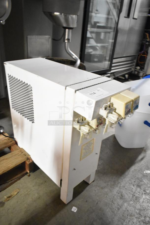 Metal commercial countertop slushie machine, 3 flavors, 115 volts, 1 phase, good condition, visible control panel and vents.