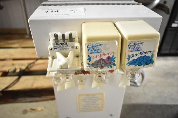 Metal countertop slushie machine, 3 flavors, 115 volts, 1 phase. Raspberry and Blackberry labels visible. Model 202-FN-1100.