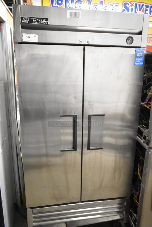2016 True T-35 stainless steel commercial 2-door reach-in cooler with poly-coated racks and commercial casters. 115V, 1 phase.