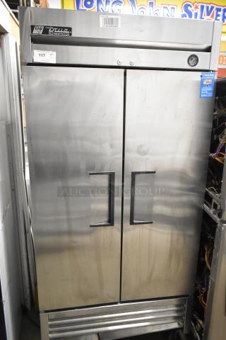 2016 True T-35 stainless steel commercial 2-door reach-in cooler with poly-coated racks and commercial casters. 115V, 1 phase.