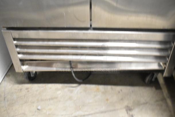 2016 True T-35 stainless steel reach-in cooler, 2-door, poly-coated racks, commercial casters, 115V, 1-phase, excellent condition.