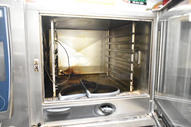 RAtional SCCWE62/SCCWE102 stainless steel commercial convection oven, interior view, 480V, 3 Phase, on casters.