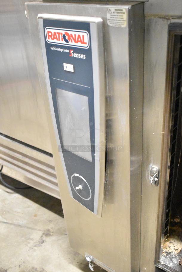 2019 Rational SCCWE62/SCCWE102 stainless steel self-cooking convection oven, electric, on casters, brand tag visible.