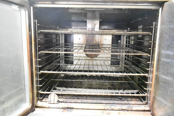 Imperial stainless steel convection oven, full-size, view-through door, metal racks, thermostatic controls, commercial-grade.