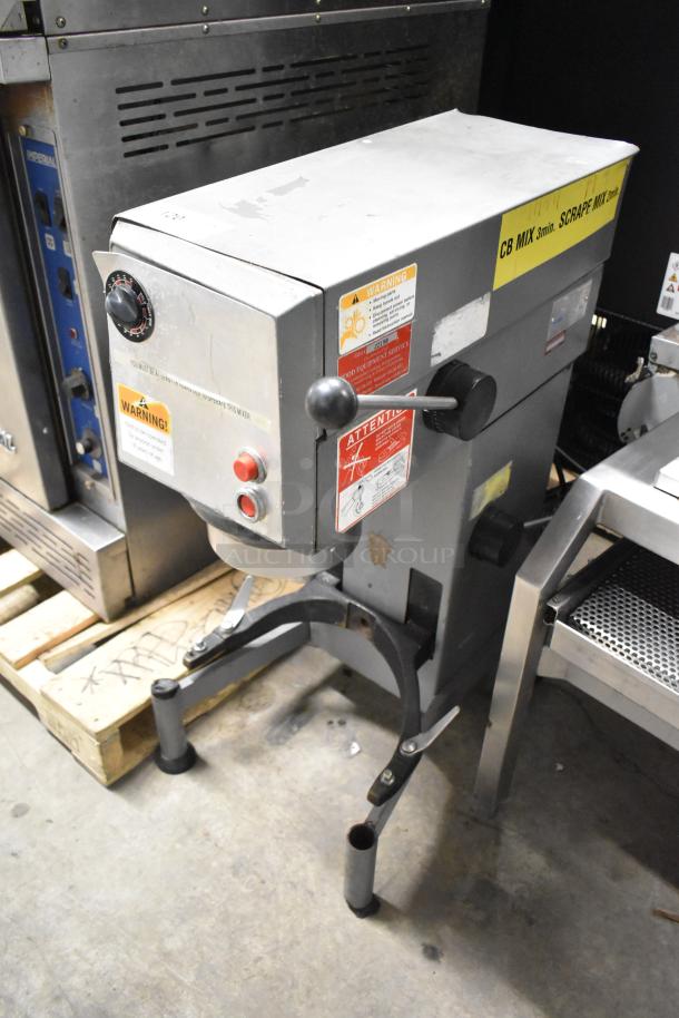 Varimixer W20 commercial 20-quart planetary dough mixer, metal, 115 volts, 1 phase, visible warning labels, sturdy condition.