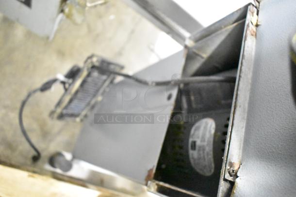 Varimixer W20 Commercial 20 Quart Dough Mixer, metal construction. 115 volts, 1 phase. Some visible rust and wear.