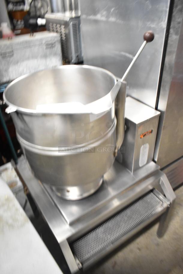 Groen TDB/7-40 stainless steel 40-quart commercial steam kettle on stand, featuring manual tilt and control panel.