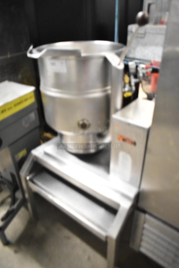 Groen TDB/7-40 stainless steel 40-quart steam kettle on stand. Features include manual tilt handle and valve. Suitable for commercial use.