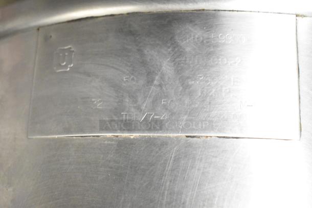 Groen TDB/7-40 stainless steel 40-quart steam kettle on stand, features engraved model and serial numbers on sturdy metal.