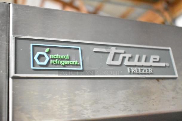 2020 True T-49F-HC stainless steel 2-door commercial freezer, natural refrigerant label, on commercial casters.