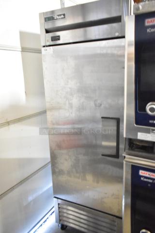 2018 True T-23F-HC stainless steel single door reach-in freezer, commercial casters, poly-coated racks. 115V, 1 phase.
