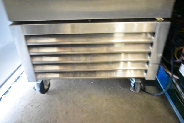 2018 True T-23F-HC stainless steel commercial freezer with poly coated racks and commercial casters. 115V, 1-phase.