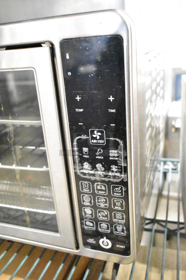 Gourmia GTF7660 countertop digital air fryer oven, metal finish, touch controls for various functions, 120 volts, 1 phase.