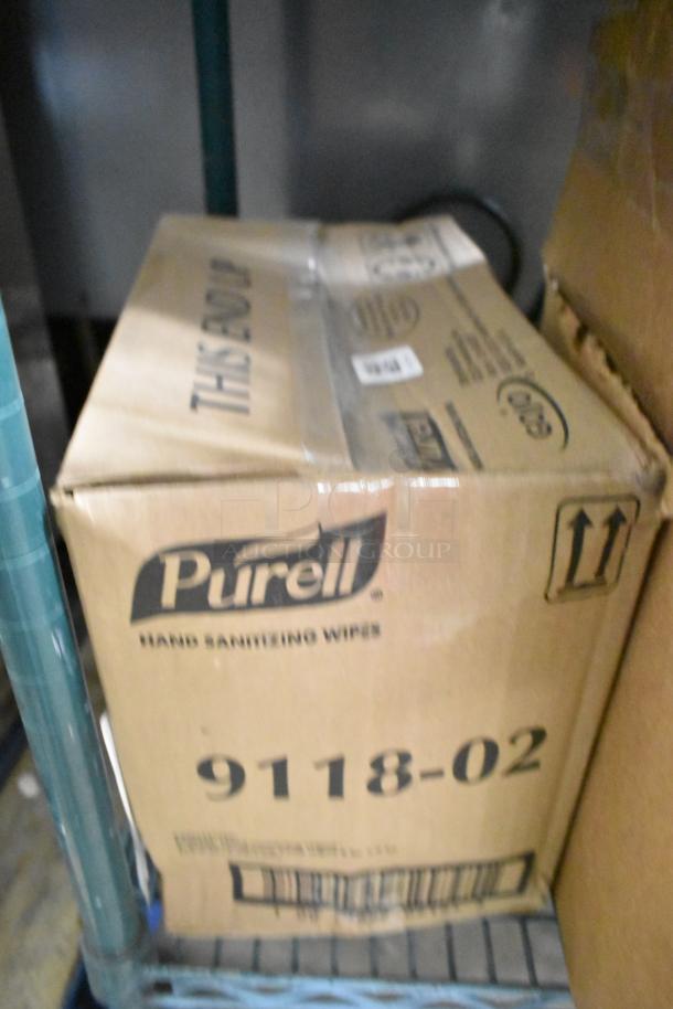 Box of Purell Hand Sanitizing Wipes on a shelf, showing model 9118-02. Contains 5 items including Choice To Go containers.