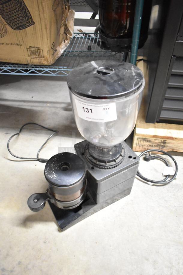 Bunn ES-1G metal commercial espresso bean grinder, 120 volts, used condition. Features hopper, dial controls, label marked "131".