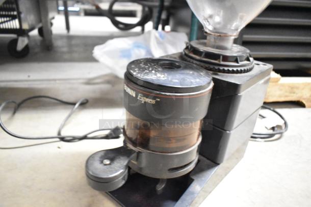 Bunn ES-1G metal commercial espresso grinder, 120 volts, 1 phase. Visible wear, clear bean hopper attached.
