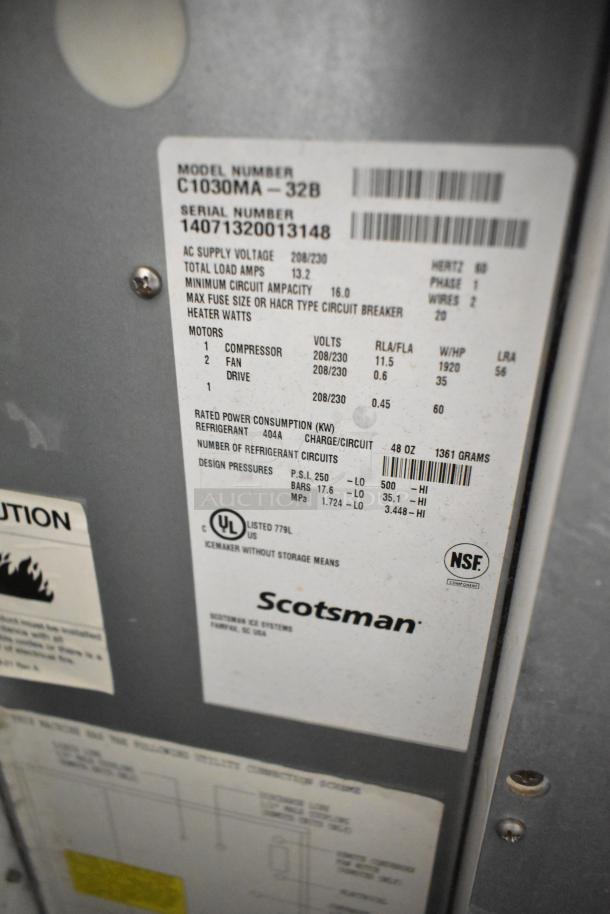 Scotsman Prodigy C1030MA-32B ice machine label with specs; 208/230 volts, 1 phase, model and serial numbers visible.