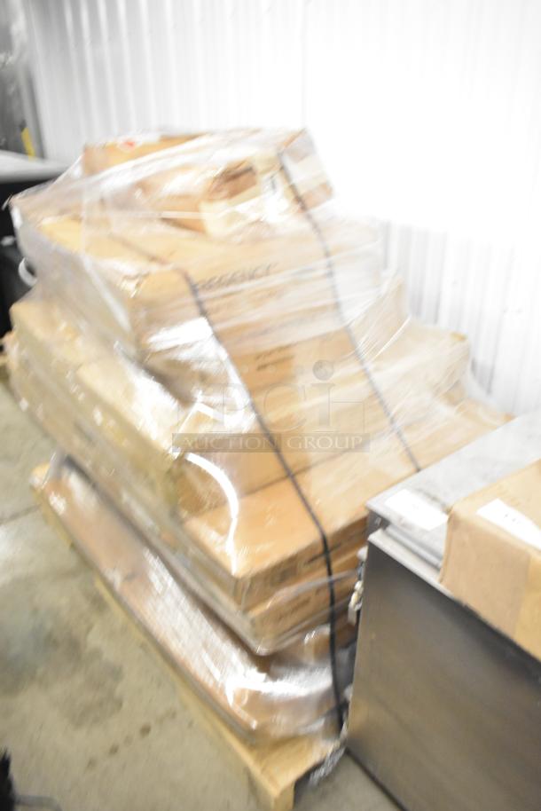 Pallet of 14 brand new scratch and dent items: wine shelves, butcher block table tops; wrapped for shipping.