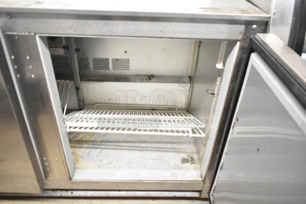 Beverage Air UCR48A stainless steel 2-door undercounter cooler, 115 volts, 1 phase, fair condition, interior shelves.