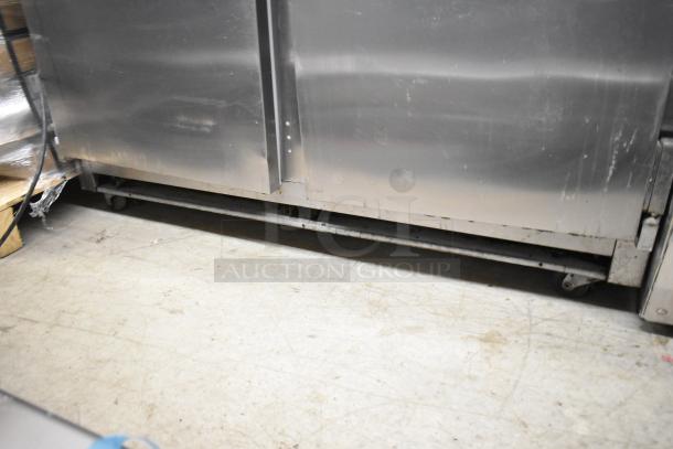 Beverage Air UCR48A stainless steel 2-door undercounter cooler, 115V, showing exterior condition on casters.