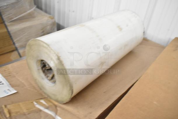 Roll of industrial material, part of a lot including Hobart metal pieces. Sold as "3 Times Your Bid," condition appears used.
