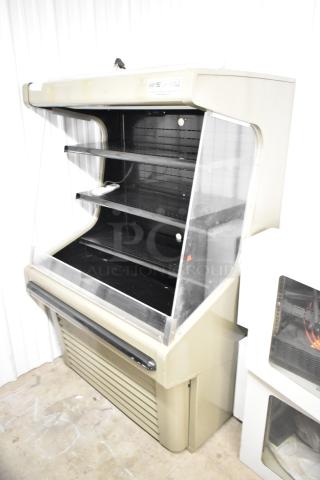 Hussmann GSVM-4060 commercial merchandiser, metal, grab-n-go style, 115 volts, 1 phase, beige, multiple shelves, used condition.