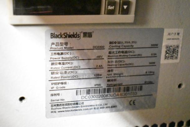 2 BlackShields DC0300 white metal cabinets, model DC0300, 300W cooling capacity, 48V power supply, IP55 rated.