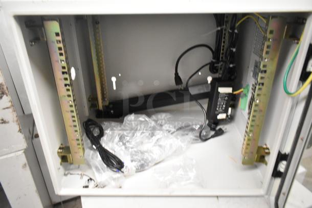 BlackShields DC0300 white metal cabinet interior. Includes wiring and fittings. Good condition, ideal for data equipment.