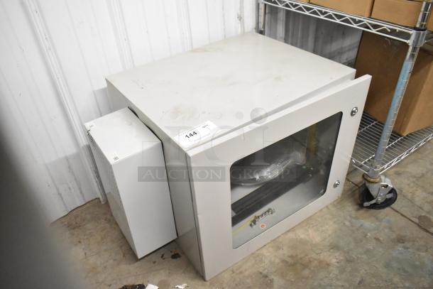 BlackShields DC0300 white metal cabinet with glass panel, minor wear, tag labeled "144 QTY 01."